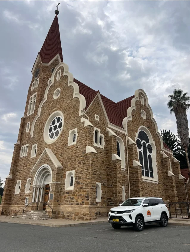 The Quiver Car Rental Toyota Fortuner parked outside the Christuskirche in Windhoek